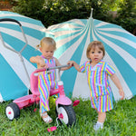 cute toddler boy wearing striped vintage cabana set