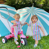 cute toddler boy wearing striped vintage cabana set