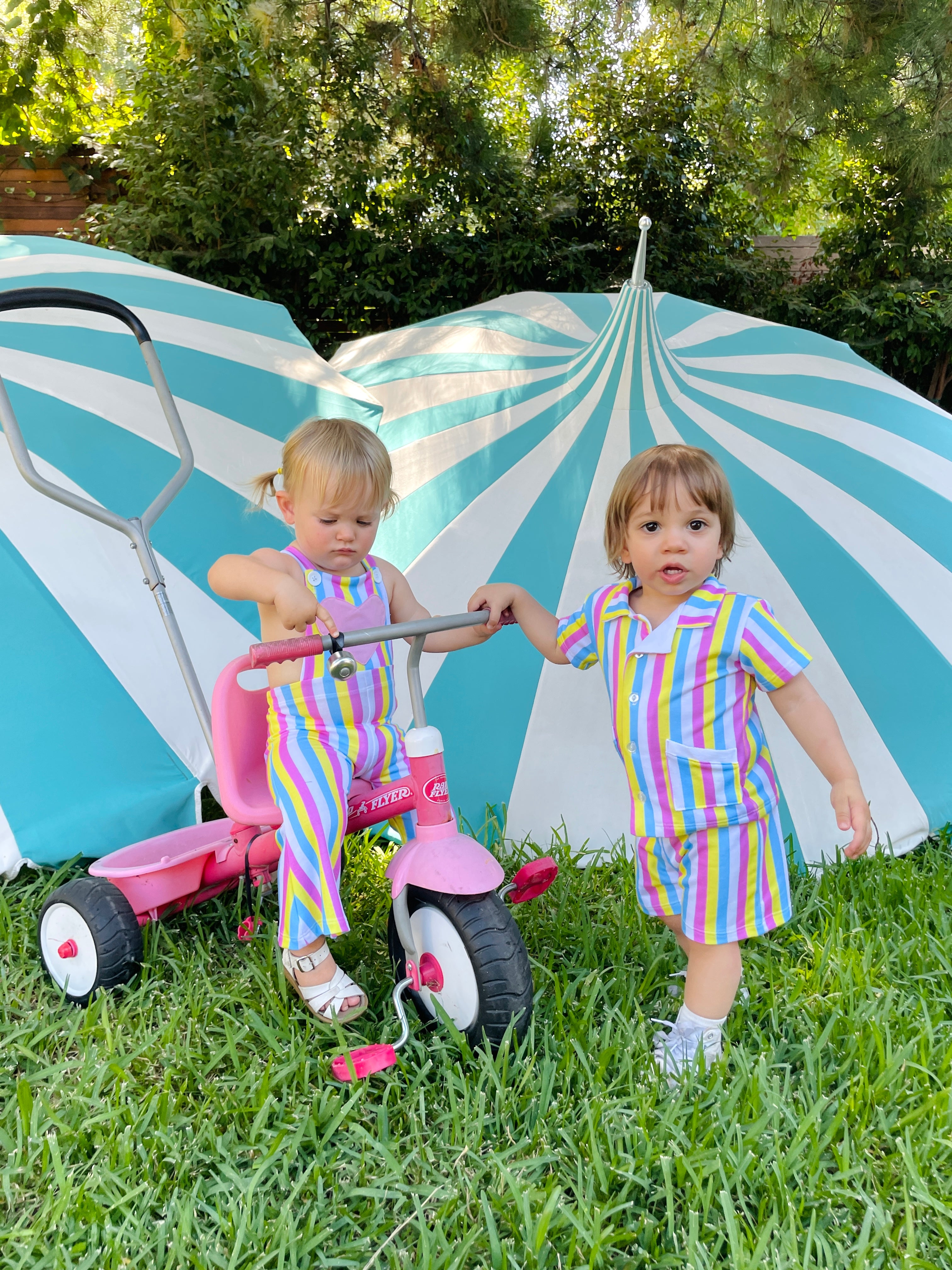 cute toddler boy wearing striped vintage cabana set