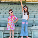 girls wearing colorful retro kids clothes