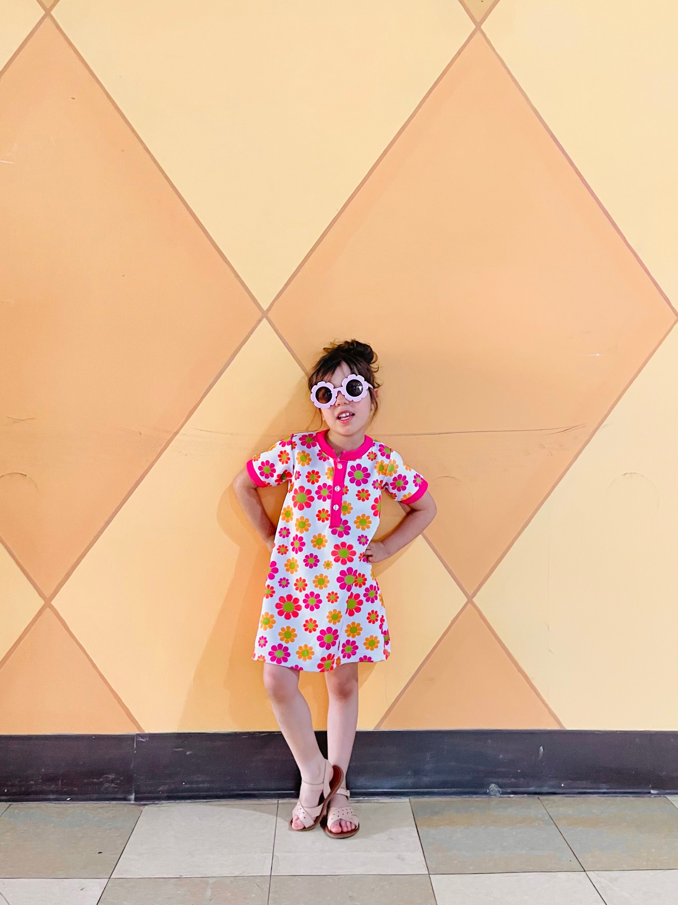 toddler girl wearing retro flower power dress