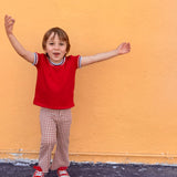 child wearing brown gingham retro bell bottom pants