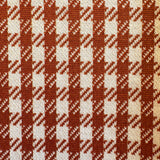 close up brown gingham double knit fabric