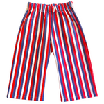 children's vintage Red, white, and blue striped pants on a light yellow background
