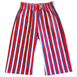 children's vintage Red, white, and blue striped pants on a light yellow background