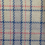 Close-up of fabric with blue and pink plaid pattern