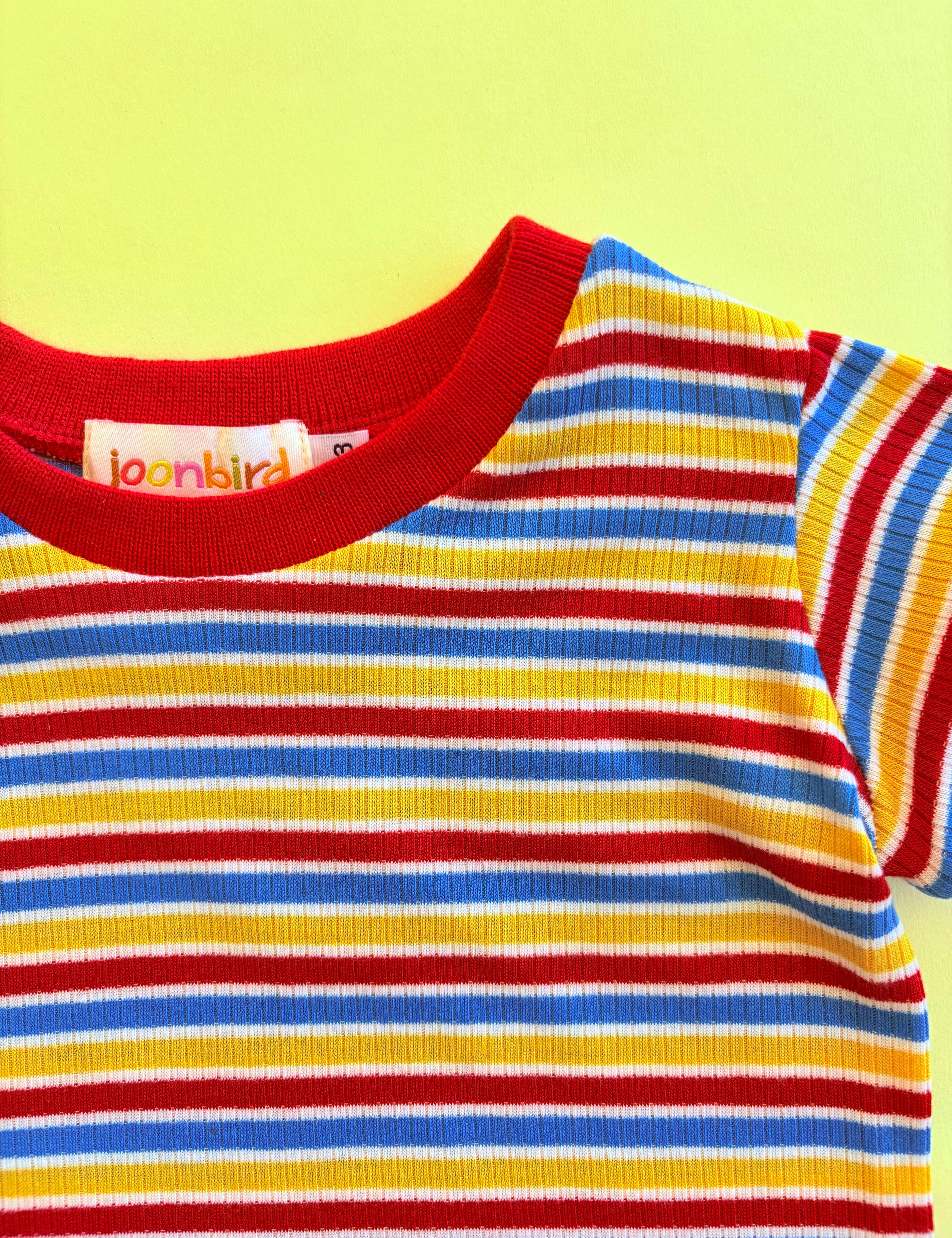 Closeup of colorful striped kids shirt