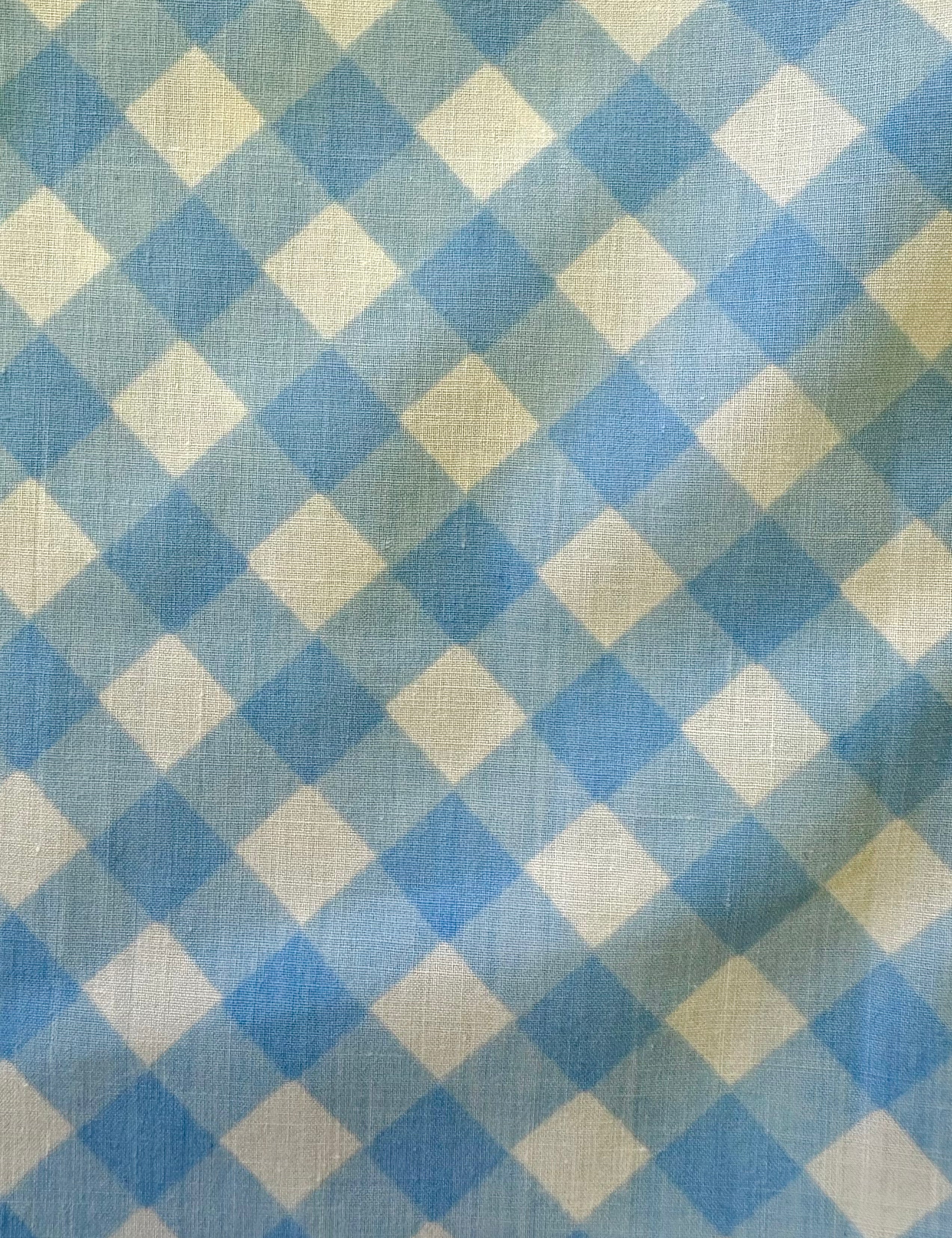 closeup of blue checkered vintage fabric 