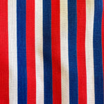 Fabric with red, white, and blue vertical stripes