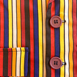 Close-up of a colorful children boys toddler kids striped shirt with buttons