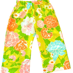 Toddler kids Colorful floral-patterned pants on a light background