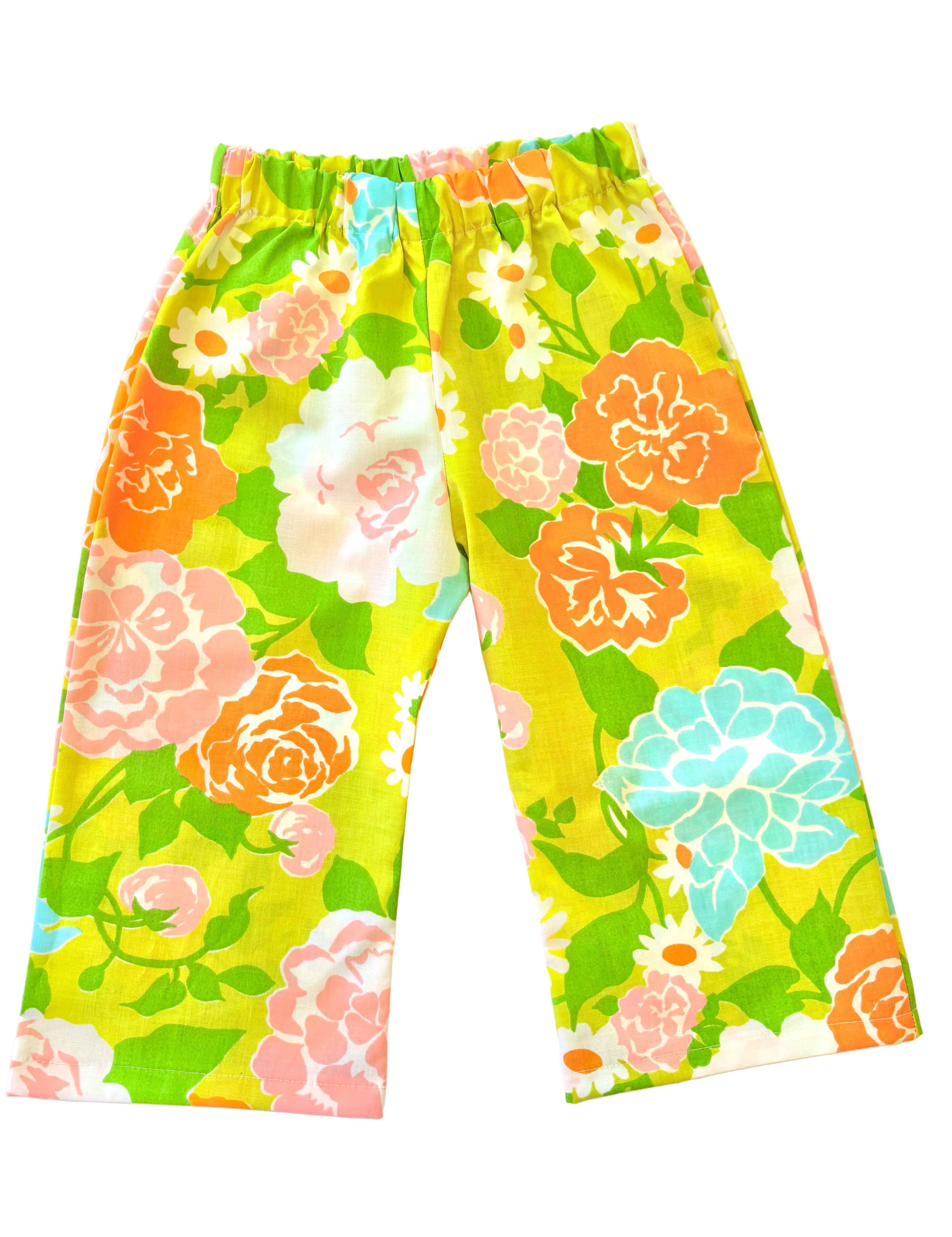 Toddler kids Colorful floral-patterned pants on a light background
