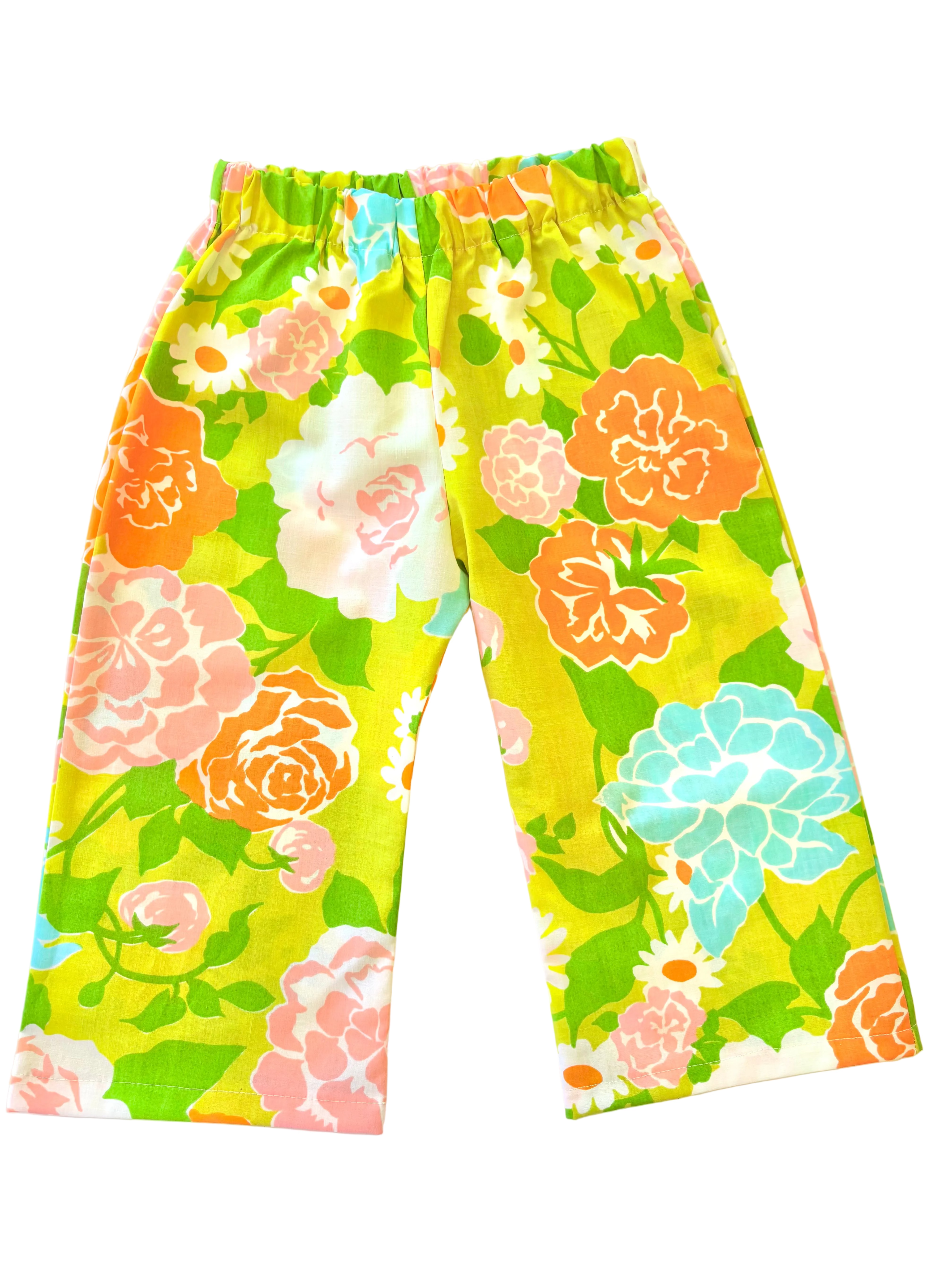 Toddler kids Colorful floral-patterned pants on a light background