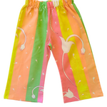 Colorful children's pants with bird design on a light green background