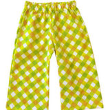 retro Green and yellow checkered toddler kids pants on a white background