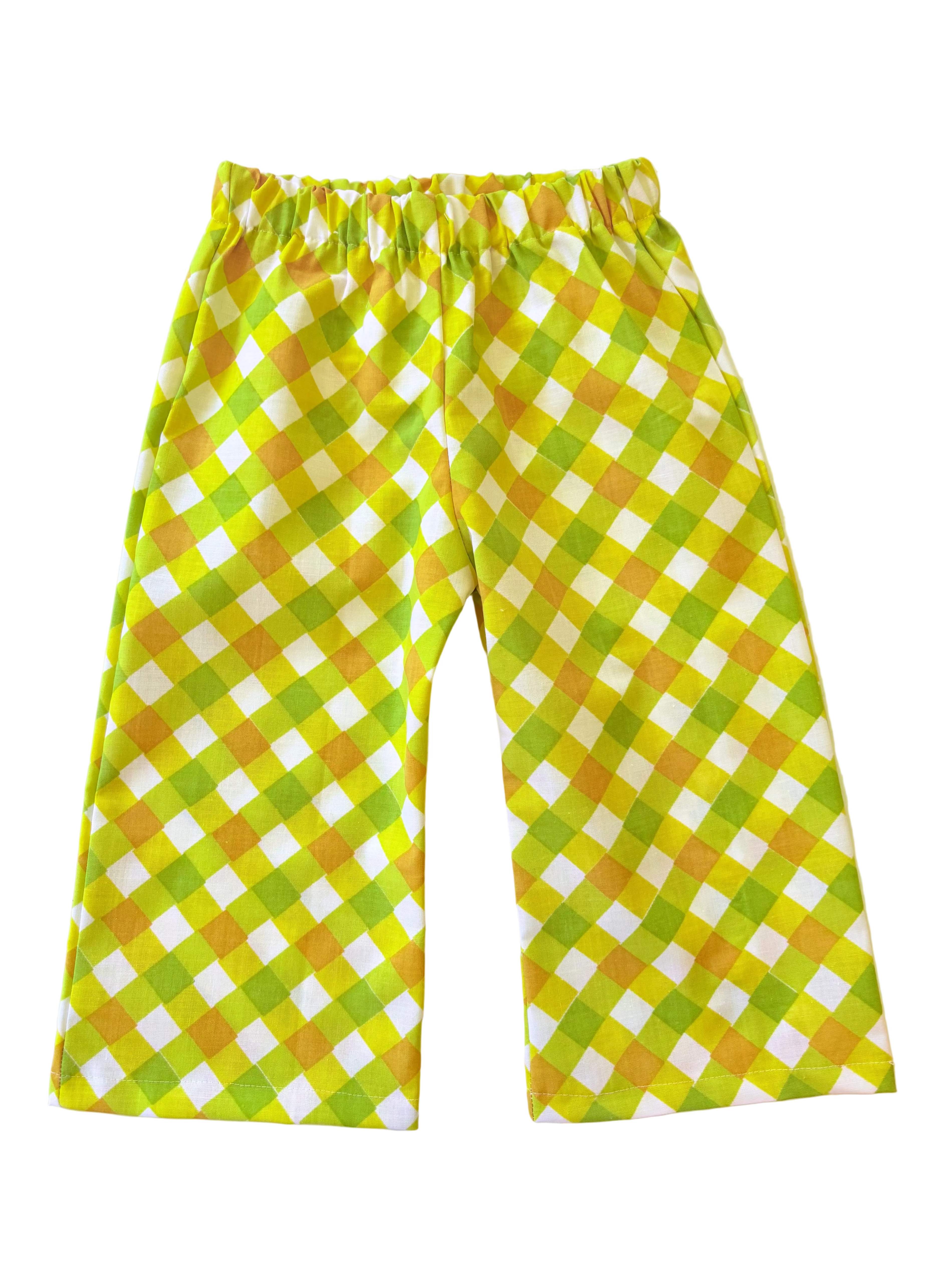 retro Green and yellow checkered toddler kids pants on a white background