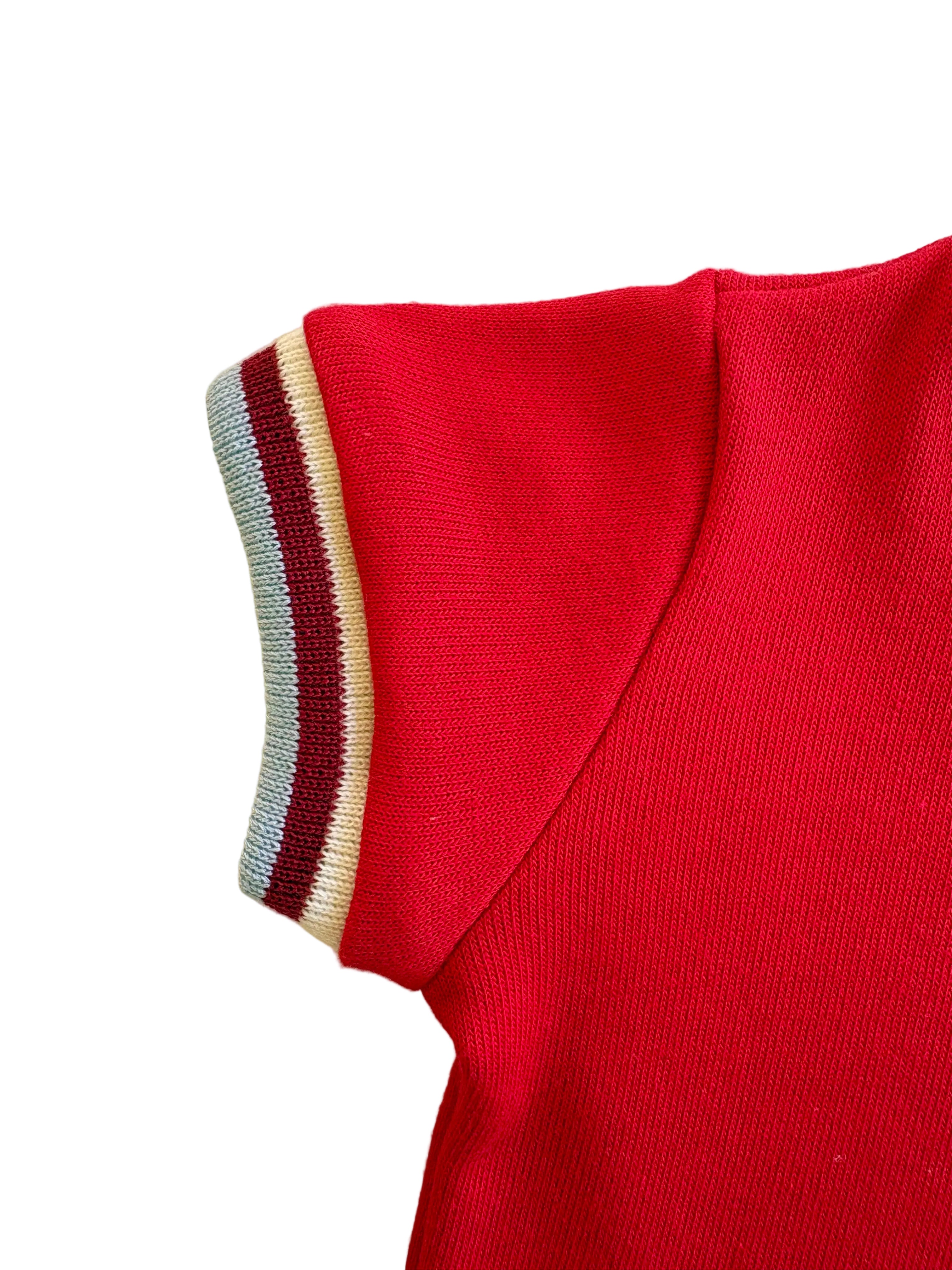 close up of retro trim on kids red shirt