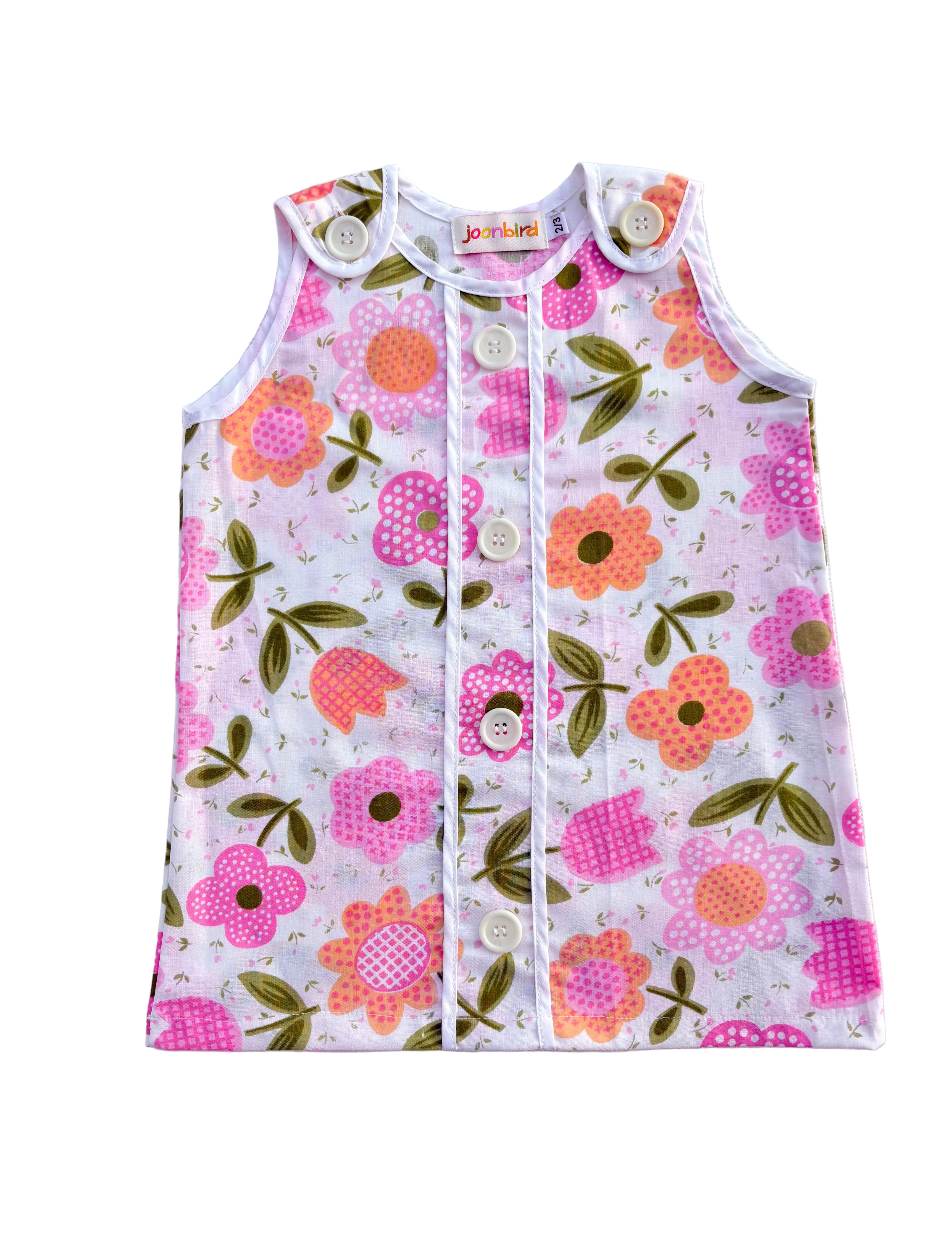 girls first birthday groovy pink floral dress on white background
