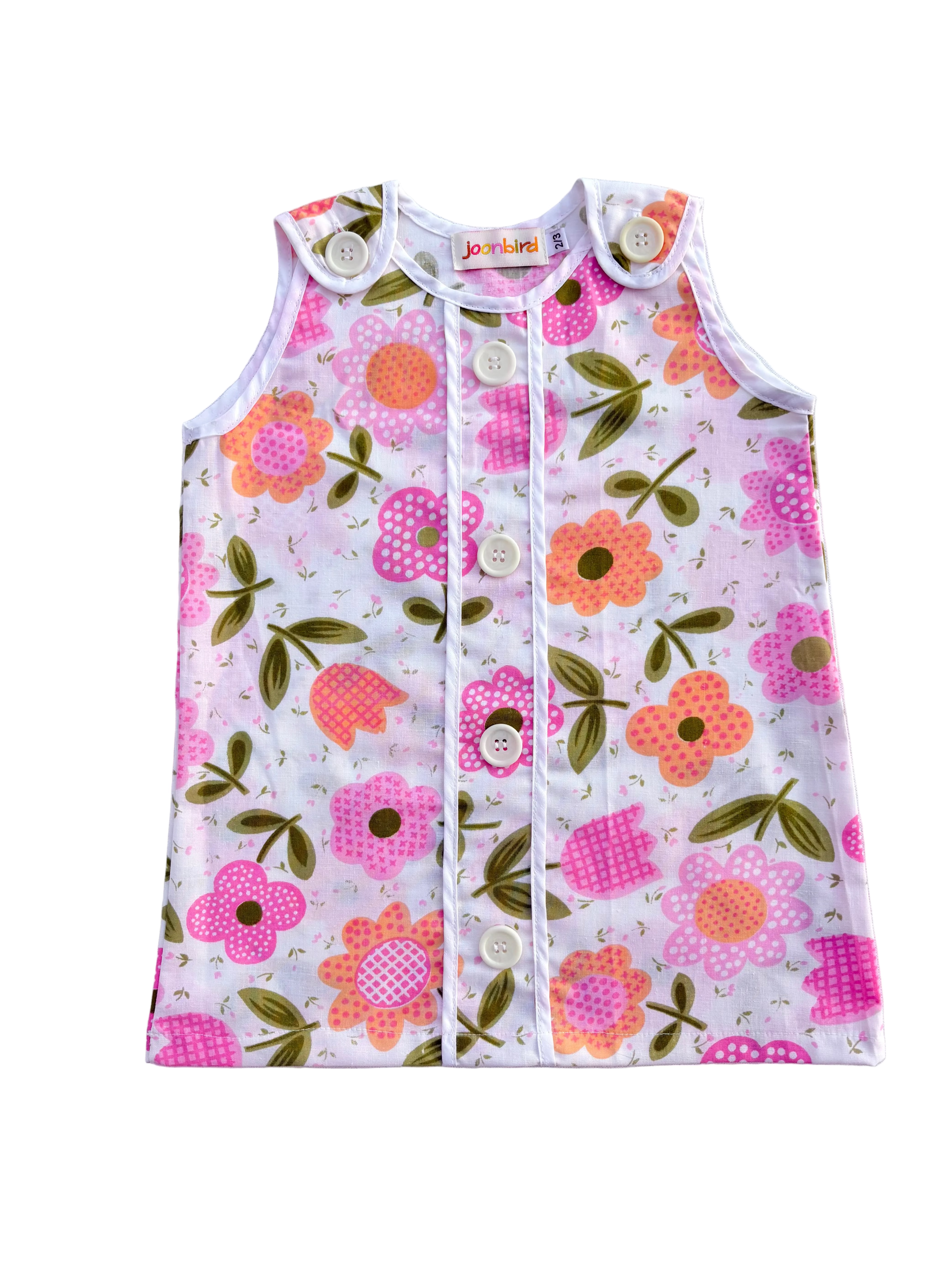 girls first birthday groovy pink floral dress on white background