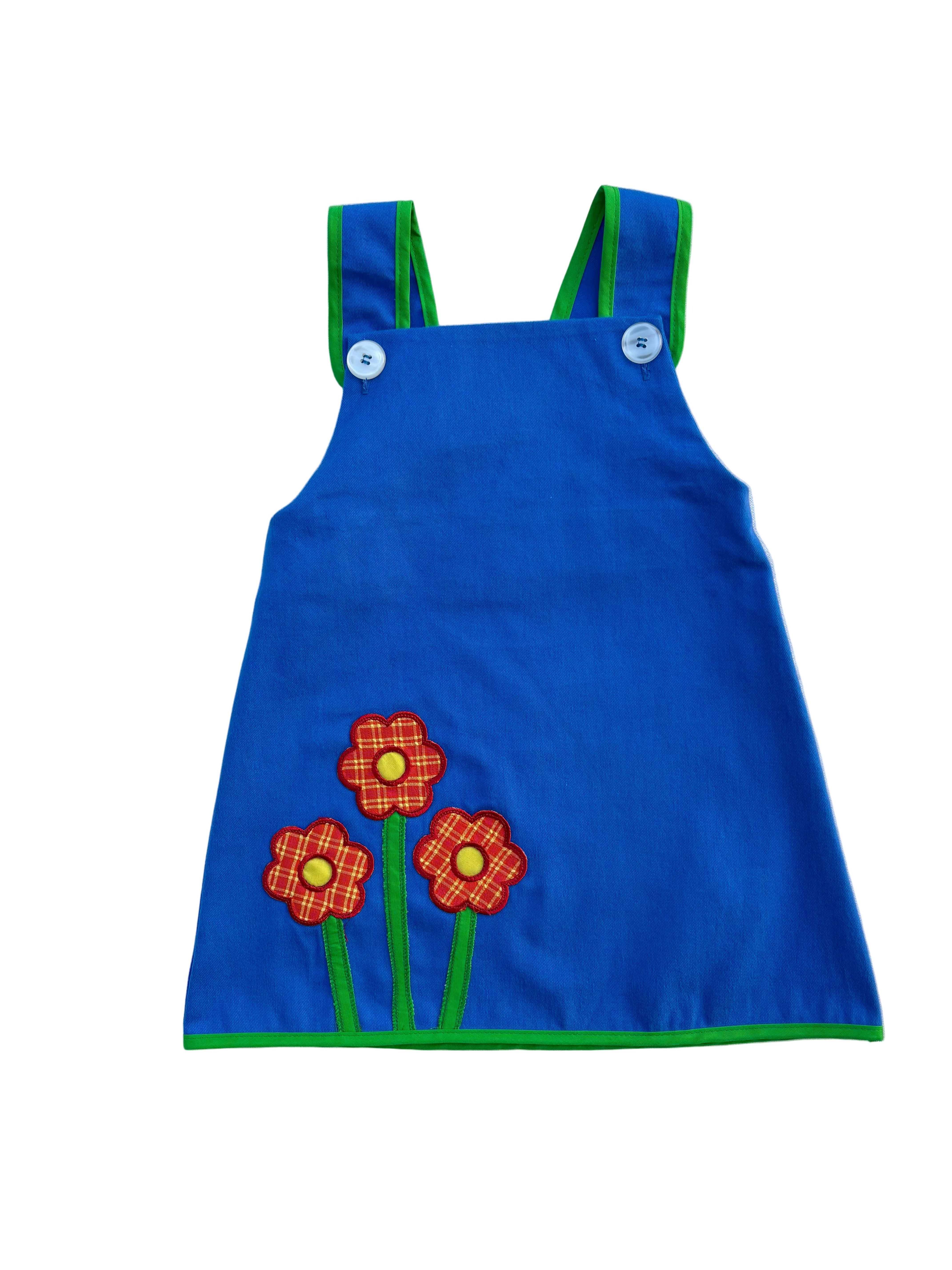 girls vintage inspired blue a-line dress with flower patches on a white background