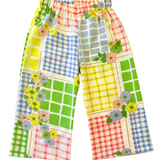 toddler kids girls Colorful checkered pants with floral patterns on a light yellow background