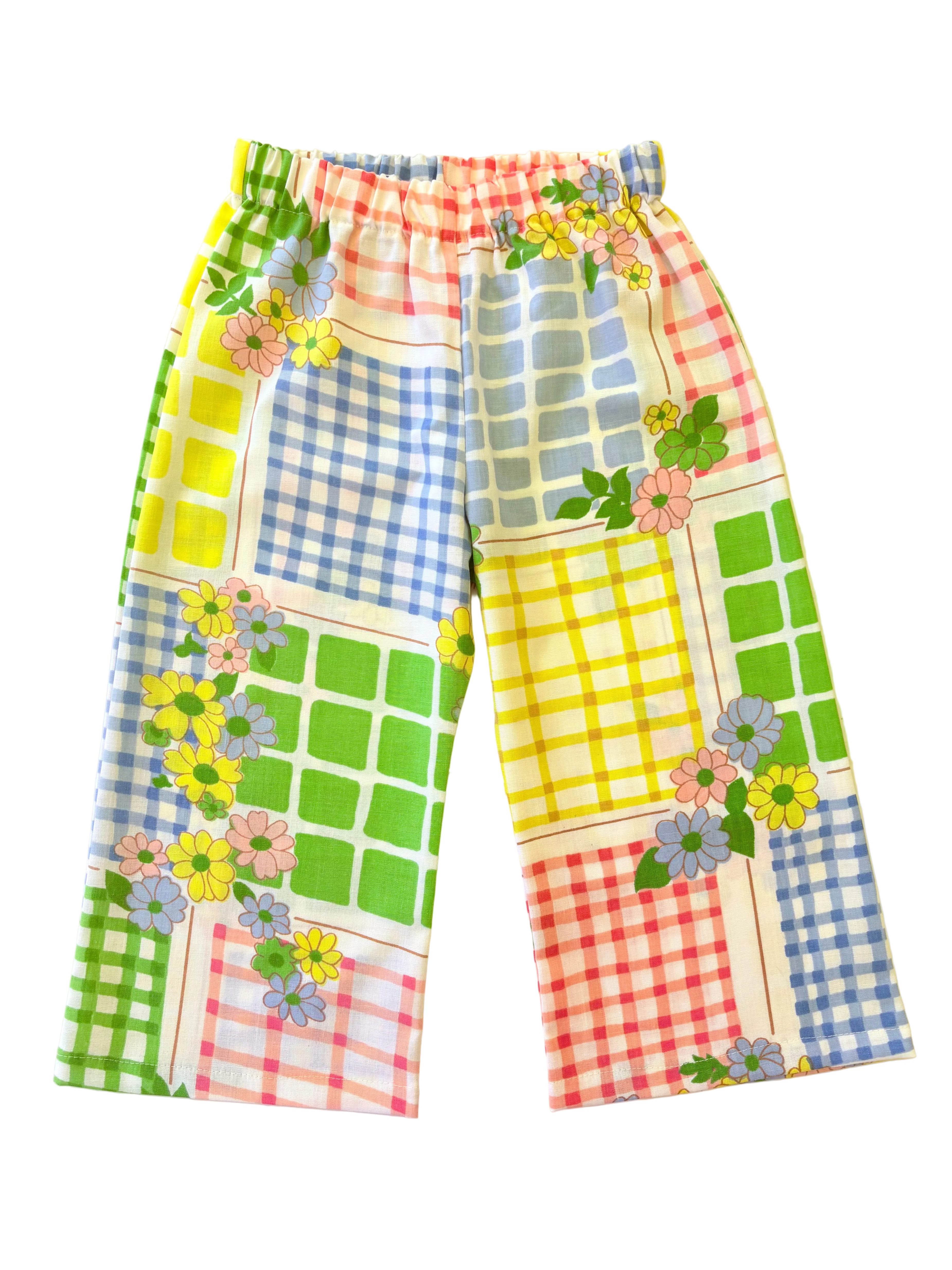toddler kids girls Colorful checkered pants with floral patterns on a light yellow background