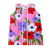 groovy girls flower power pink dress with purple and white flowers on a white background