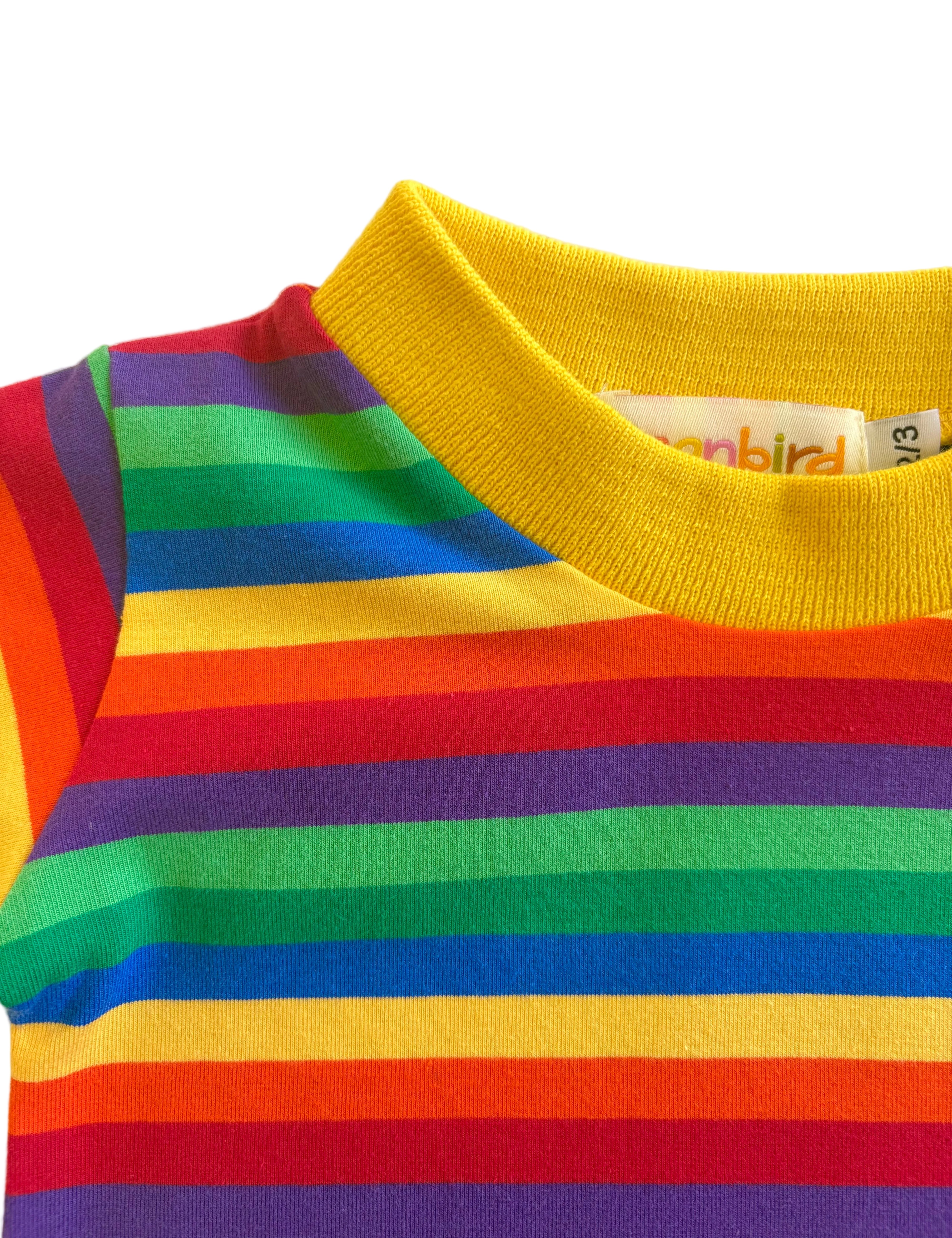 close up of kids rainbow tee with yellow trim
