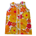 girls flower power mod style red and yellow floral dress with white background 