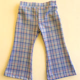 kids plaid pants on yellow background
